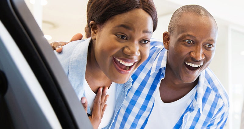 smiling couple Stevens Point Auto Center in Stevens Point WI